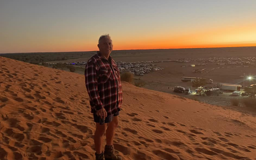 Big Red Bash 2024 Birdsville. Daz on Big red looking out over the camp site.